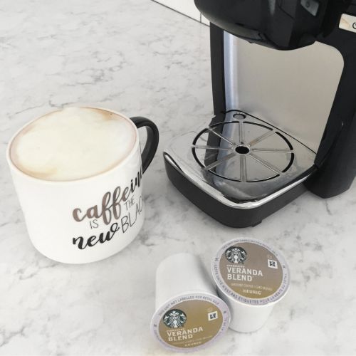 blond latte on counter with keurig and starbucks kcups