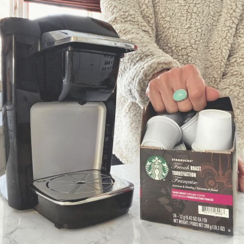 starbuck french roast kcups on counter with keurig brewer