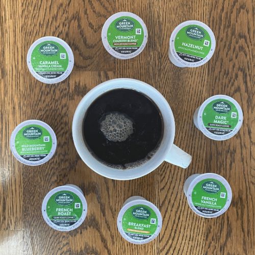 mug with kcups in a circle around it